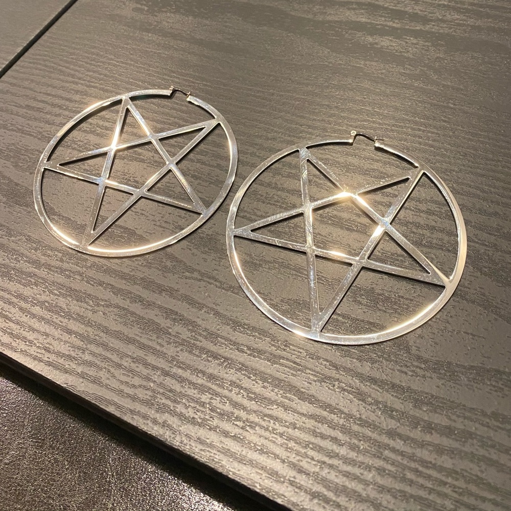 Killstar inverted pentagram earrings.